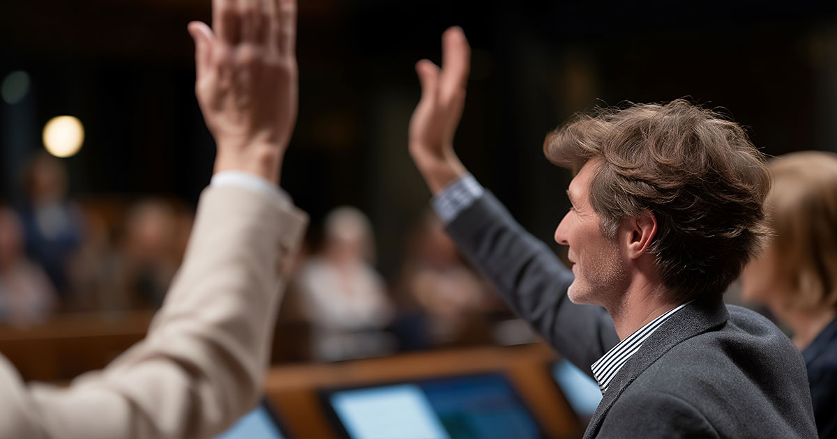 oting by raising hands or pressing electronic panels